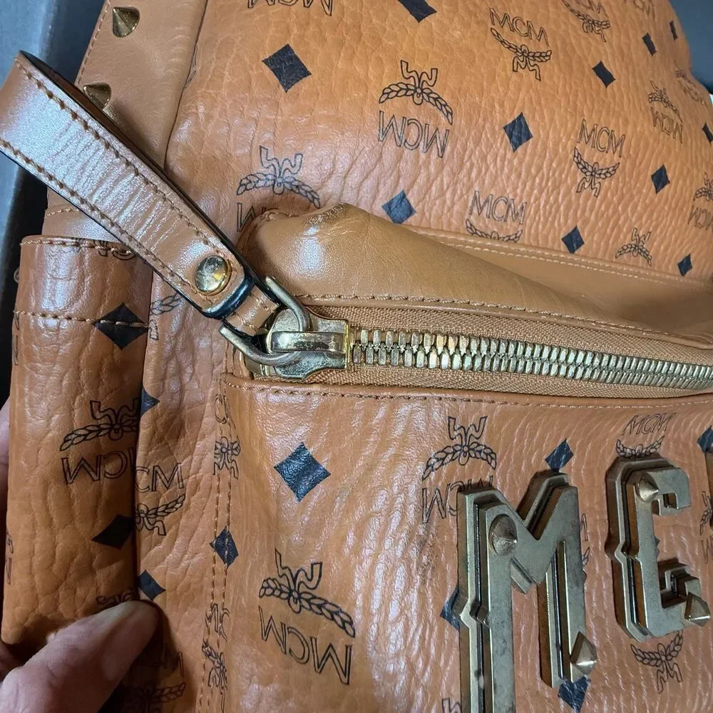 MCM Visetos Studded Medium Stark M Logo Collection Backpack Cognac Monogram